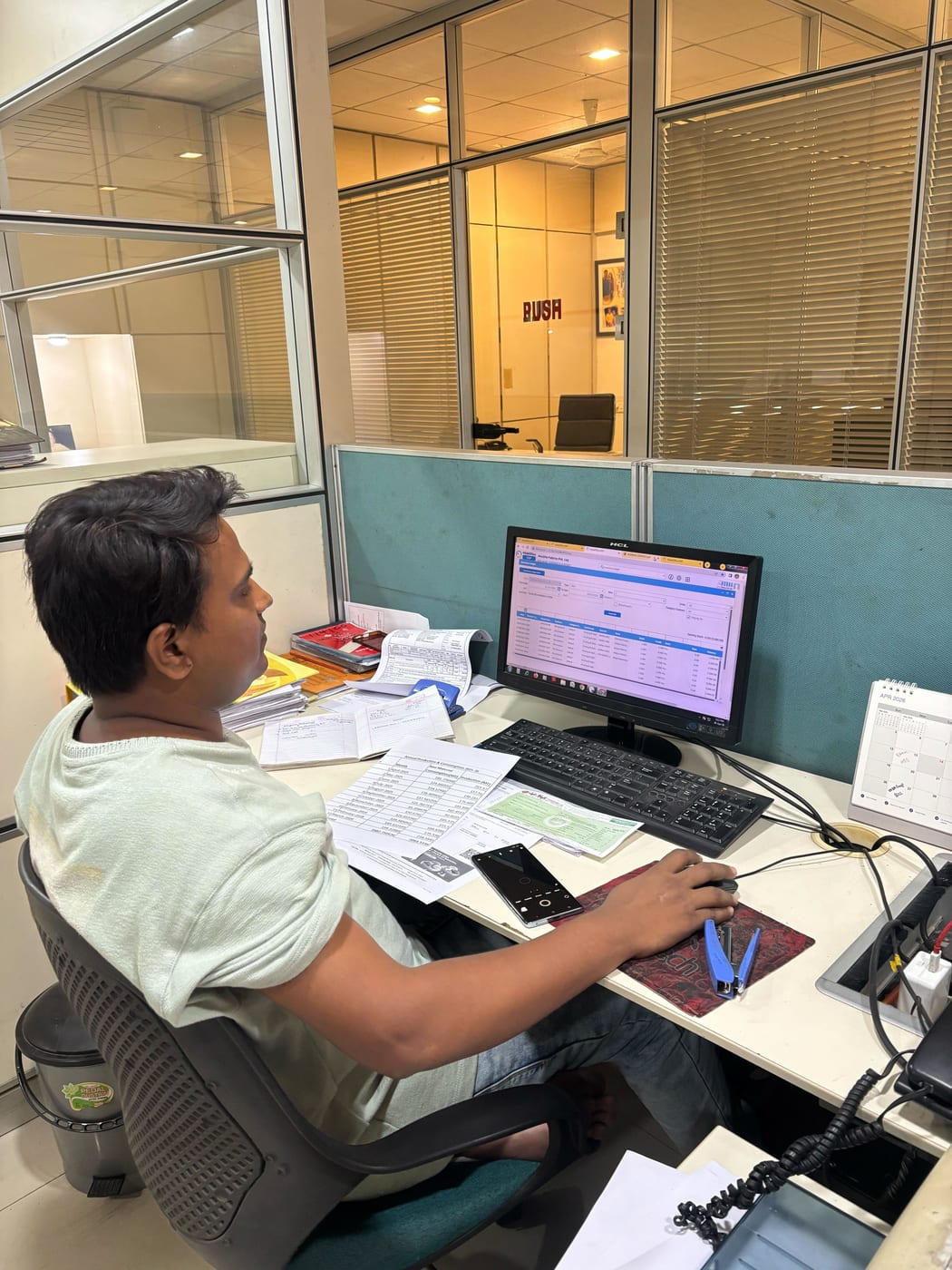 Anubha Fabrics planning team member working on MobiOffice at their desk